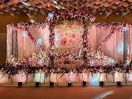 Evening reception lighting on the lawn at SatyaSushila Hotel & Resort.